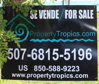 Real Estate for sale sign by Property Tropics