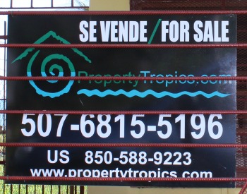 PropertyTropics.com For sale sign on house in Puerto Armuelles Panama